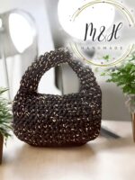 شنطه هاند ميد بلون اسود و دهبي - Image 2