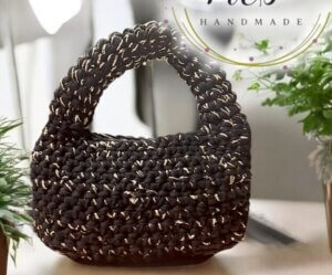 شنطه هاند ميد بلون اسود و دهبي